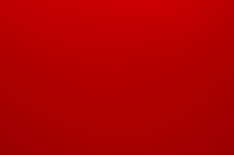 Bright and bold red abstract background, ideal for vibrant designs.