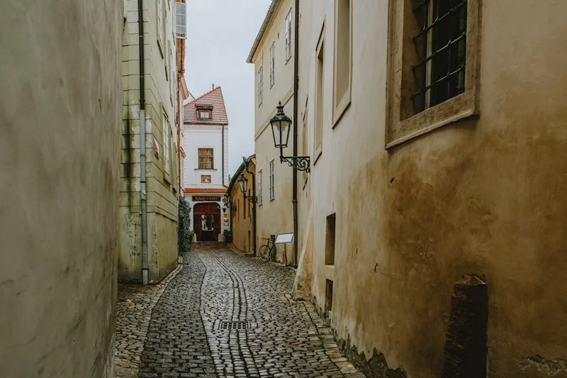 Hidden restaurant entrance in a picturesque, narrow alleyway