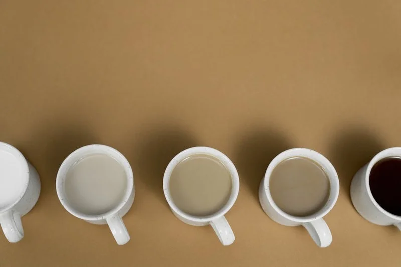 Three small cups of different specialty coffees for tasting