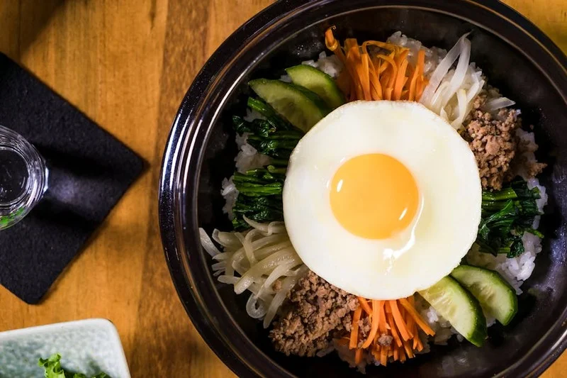 Vibrant Korean Bibimbap with various toppings