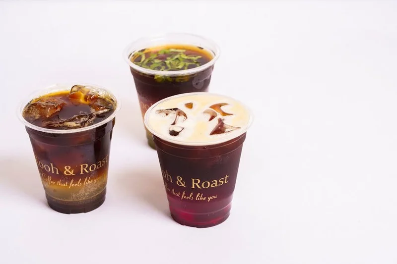 Assortment of cold brew coffee beverages, showcasing different preparations and garnishes